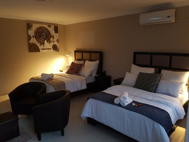 Imagen de la habitación del Hotel The Royal Prime Guest Lodge. Foto 18