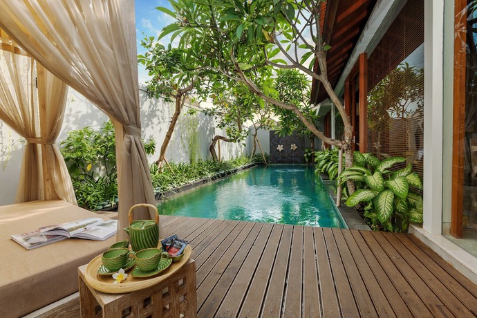 Imagen de la habitación del Hotel The Royal Purnama (adults Only). Foto 11