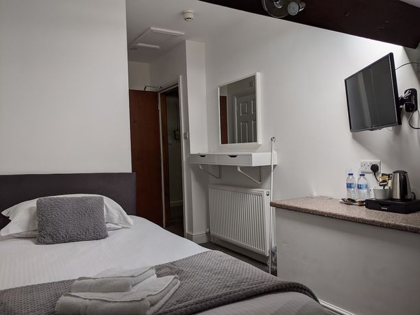 Imagen de la habitación del Hotel The Royal Station. Foto 13