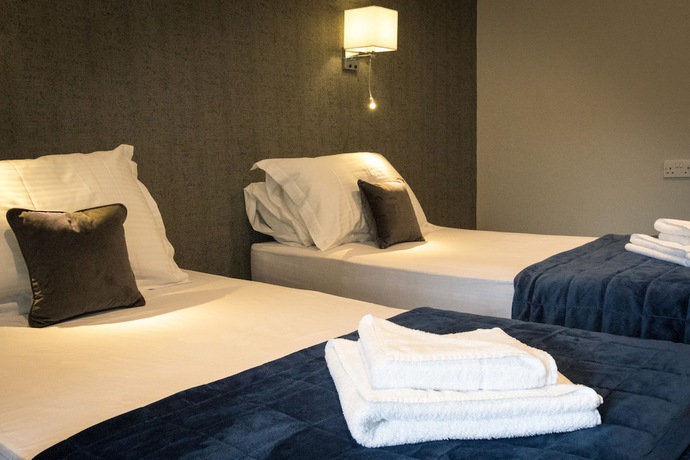 Imagen de la habitación del Hotel The Royal Station. Foto 14