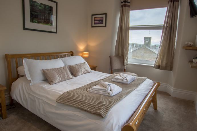 Imagen de la habitación del Hotel The Royal Station. Foto 20