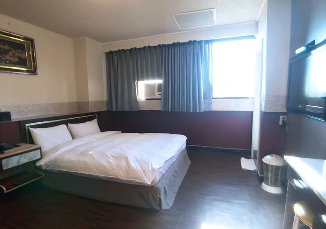 Imagen de la habitación del Hotel The Royal Taichung. Foto 2