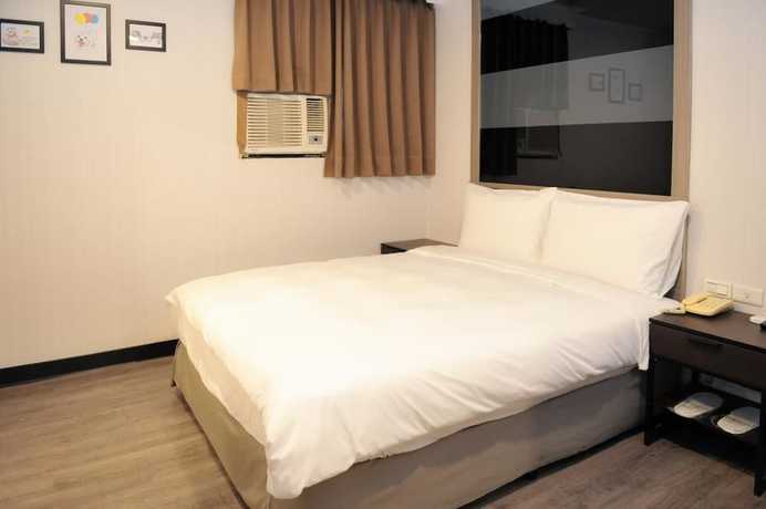 Imagen de la habitación del Hotel The Royal Taichung. Foto 15