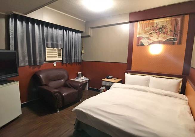 Imagen de la habitación del Hotel The Royal Taichung. Foto 17
