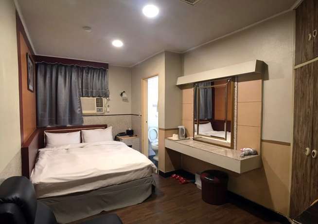 Imagen de la habitación del Hotel The Royal Taichung. Foto 18