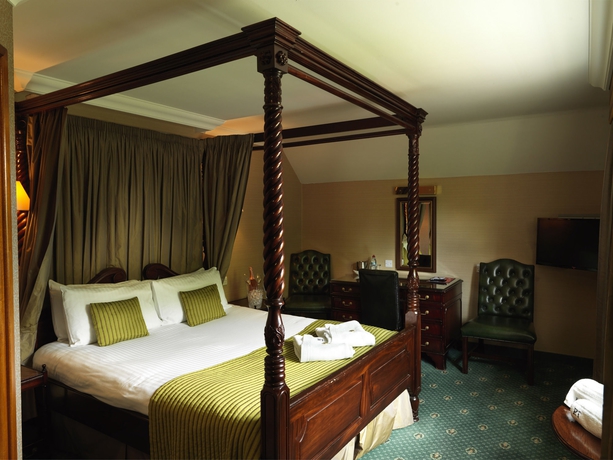 Imagen de la habitación del Hotel The Royal Toby. Foto 7