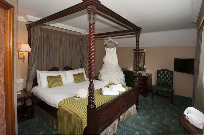 Imagen de la habitación del Hotel The Royal Toby. Foto 9