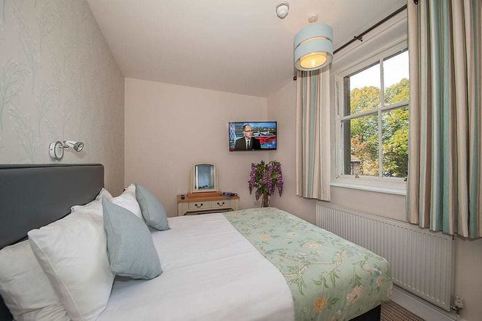 Imagen de la habitación del Hotel The Royal and Bar. Foto 5