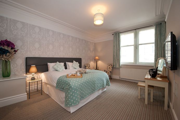 Imagen de la habitación del Hotel The Royal and Bar. Foto 6