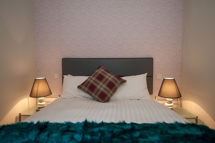 Imagen de la habitación del Hotel The Royal and Bar. Foto 11