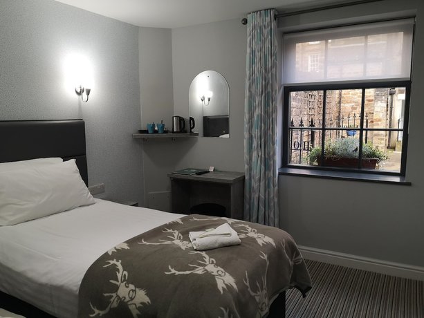 Imagen de la habitación del Hotel The Royal and Bar. Foto 13