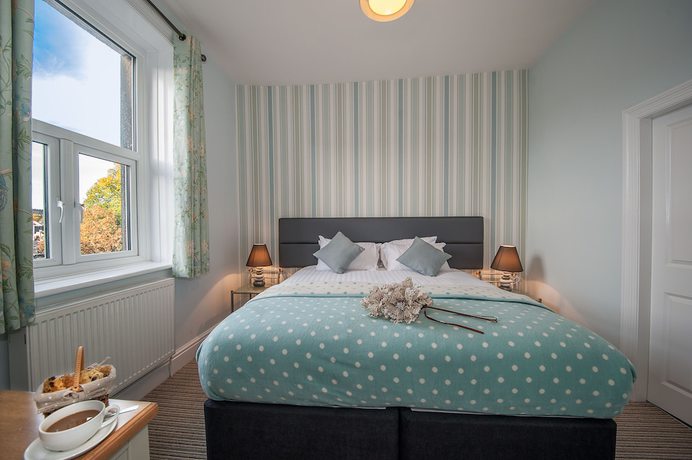 Imagen de la habitación del Hotel The Royal and Bar. Foto 18