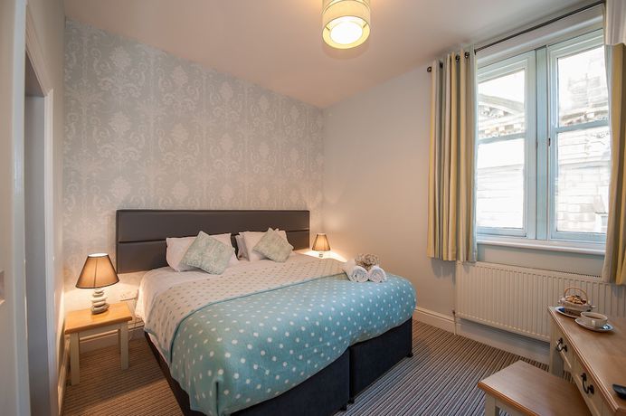 Imagen de la habitación del Hotel The Royal and Bar. Foto 19