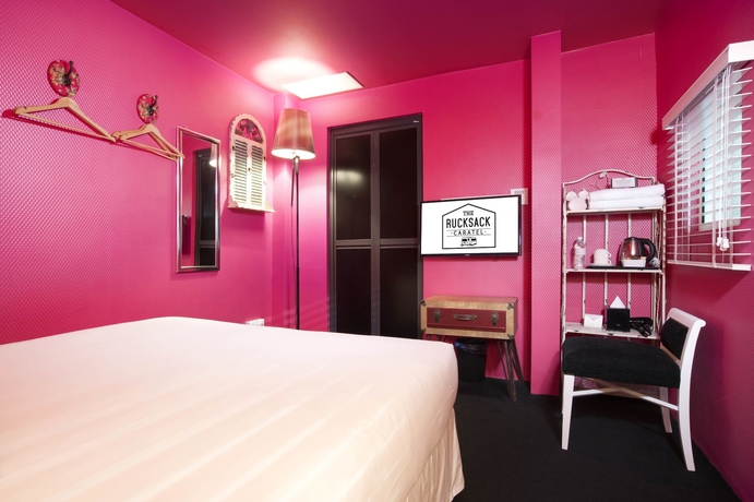 Imagen de la habitación del Hotel The Rucksack Caratel. Foto 8