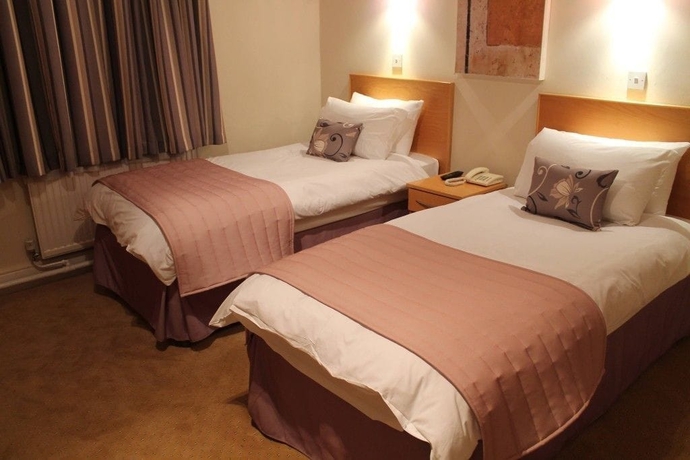 Imagen de la habitación del Hotel The Rugby. Foto 5