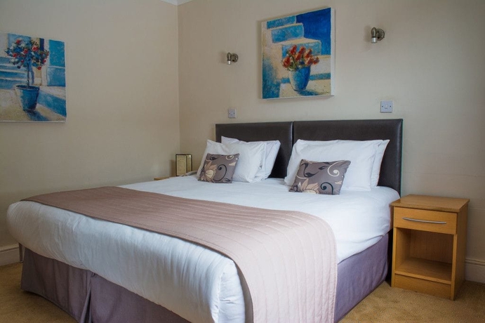 Imagen de la habitación del Hotel The Rugby. Foto 7