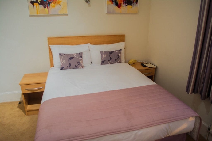 Imagen de la habitación del Hotel The Rugby. Foto 8