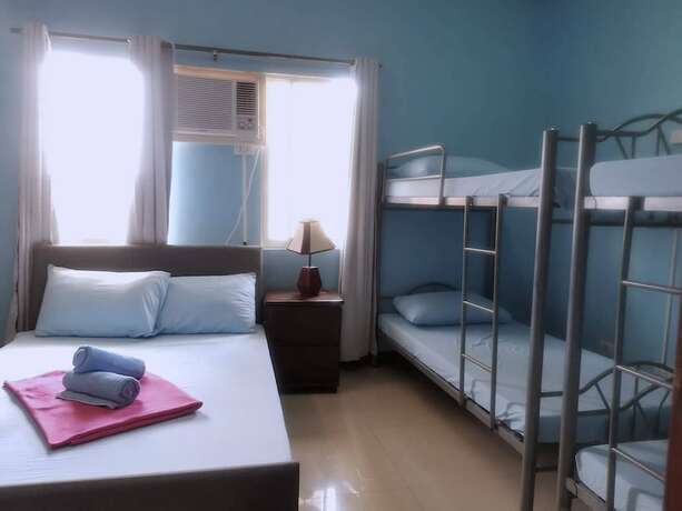 Imagen de la habitación del Hotel The Runway Inn - Mactan Cebu. Foto 15
