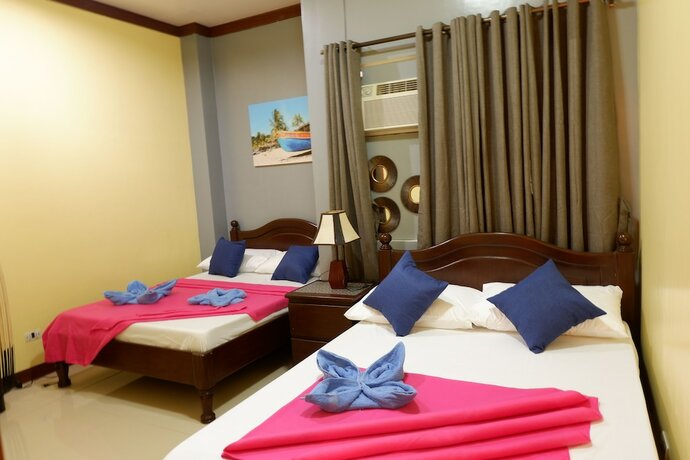Imagen de la habitación del Hotel The Runway Inn - Mactan Cebu. Foto 19