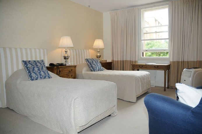 Imagen de la habitación del Hotel The Russell. Foto 11