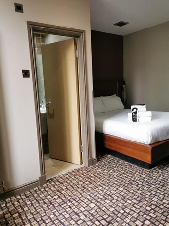 Imagen de la habitación del Hotel The Rutland. Foto 5