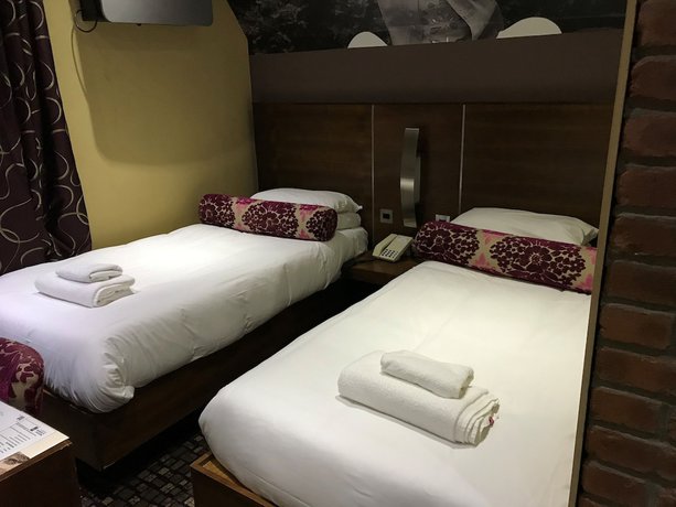 Imagen de la habitación del Hotel The Rutland. Foto 17