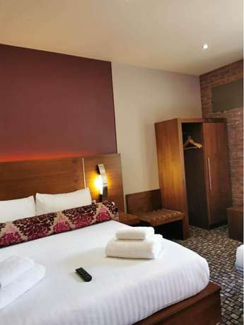 Imagen de la habitación del Hotel The Rutland. Foto 20
