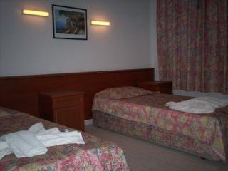 Imagen de la habitación del Hotel The S Apt and Suites. Foto 3