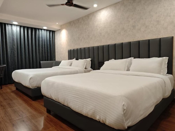 Imagen de la habitación del Hotel The Saffron, Bhubaneshwar. Foto 6