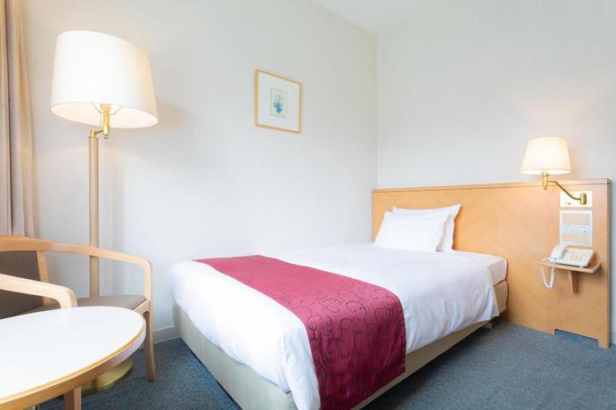 Imagen de la habitación del Hotel The Saihokukan. Foto 9
