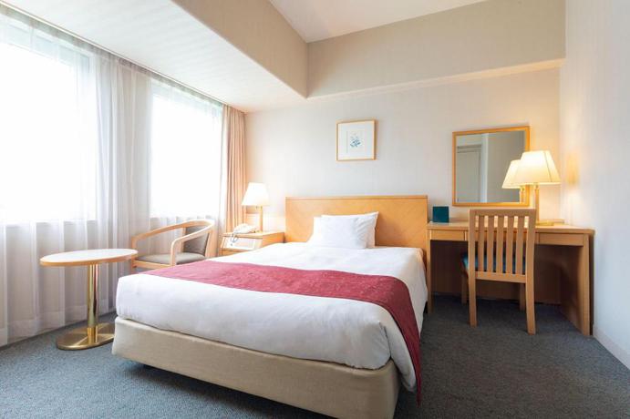 Imagen de la habitación del Hotel The Saihokukan. Foto 11
