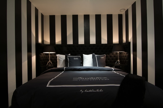 Imagen de la habitación del Hotel The Saints Bliss. Foto 10