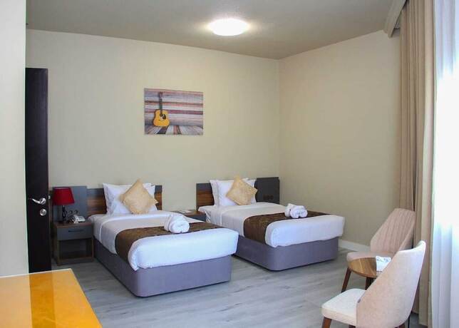 Imagen de la habitación del Hotel The Saj. Foto 7