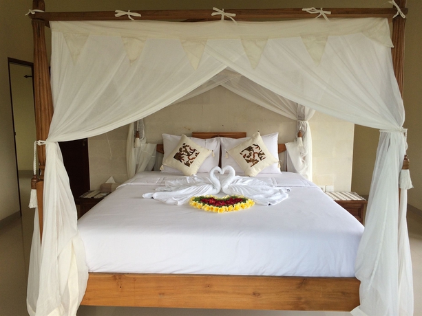 Imagen de la habitación del Hotel The Sakara Ubud Villas. Foto 5