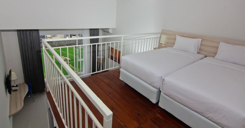 Imagen de la habitación del Hotel The Salak. Foto 7