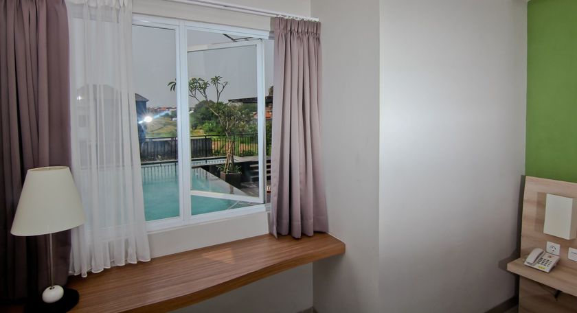 Imagen de la habitación del Hotel The Salak. Foto 11
