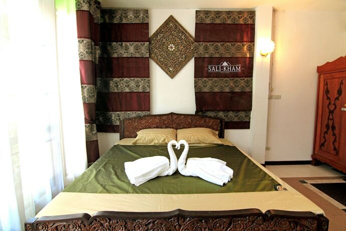 Imagen de la habitación del Hotel The Sali-Kham Traditional Lanna Home. Foto 9