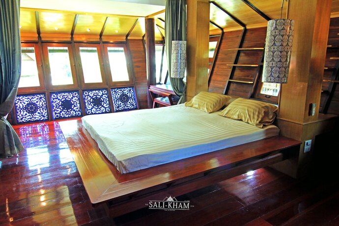 Imagen de la habitación del Hotel The Sali-Kham Traditional Lanna Home. Foto 13