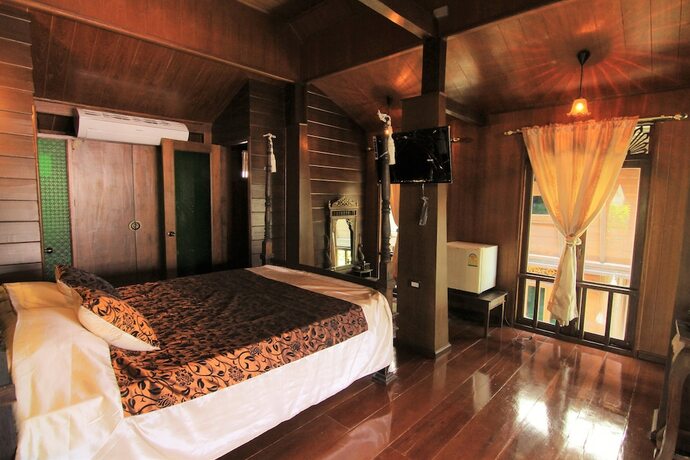 Imagen de la habitación del Hotel The Sali-Kham Traditional Lanna Home. Foto 14