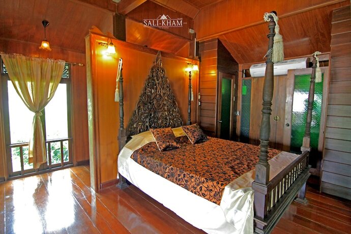 Imagen de la habitación del Hotel The Sali-Kham Traditional Lanna Home. Foto 16