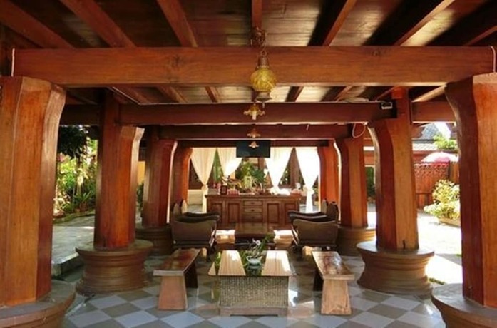 Imagen de los interiores del Hotel The Sali-Kham Traditional Lanna Home. Foto 19