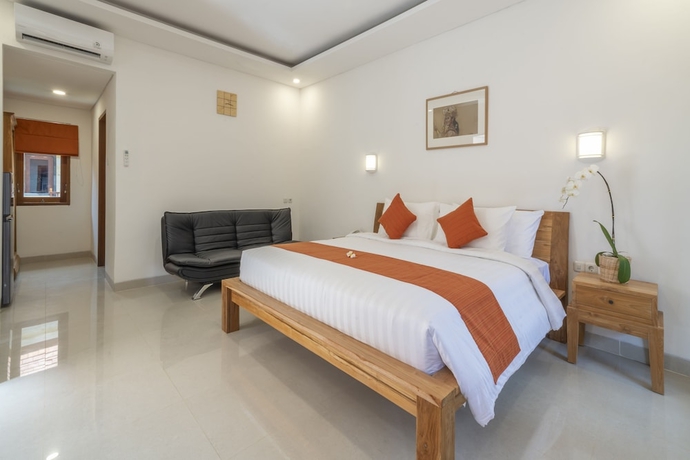 Imagen de la habitación del Hotel The Salila Beach Resort. Foto 5