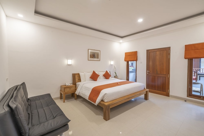 Imagen de la habitación del Hotel The Salila Beach Resort. Foto 6