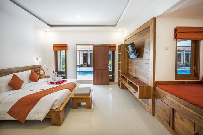 Imagen de la habitación del Hotel The Salila Beach Resort. Foto 7