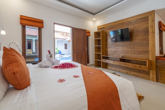 Imagen de la habitación del Hotel The Salila Beach Resort. Foto 12