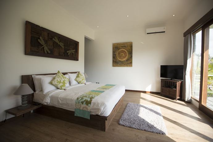 Imagen de la habitación del Hotel The Samara. Foto 14