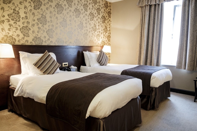 Imagen de la habitación del Hotel The Sanctuary House. Foto 10