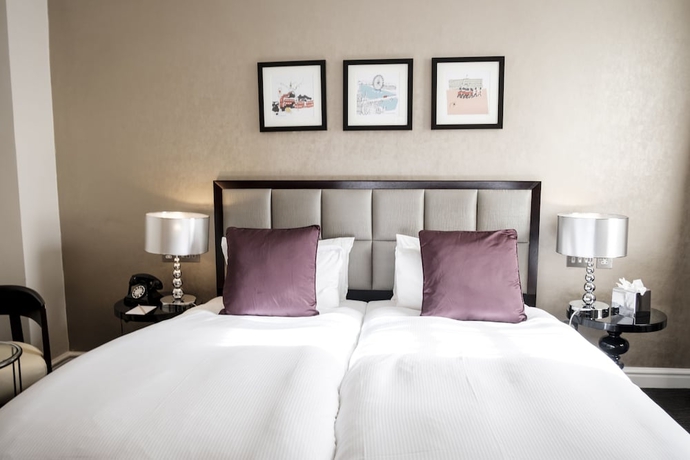 Imagen de la habitación del Hotel The Sanctuary House. Foto 15