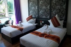 Imagen de la habitación del Hotel The Sand Beach. Foto 8