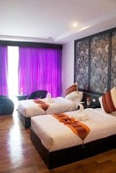 Imagen de la habitación del Hotel The Sand Beach. Foto 10